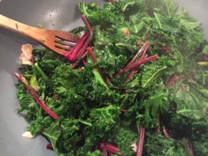 Saute the chard and greens handful at a time 